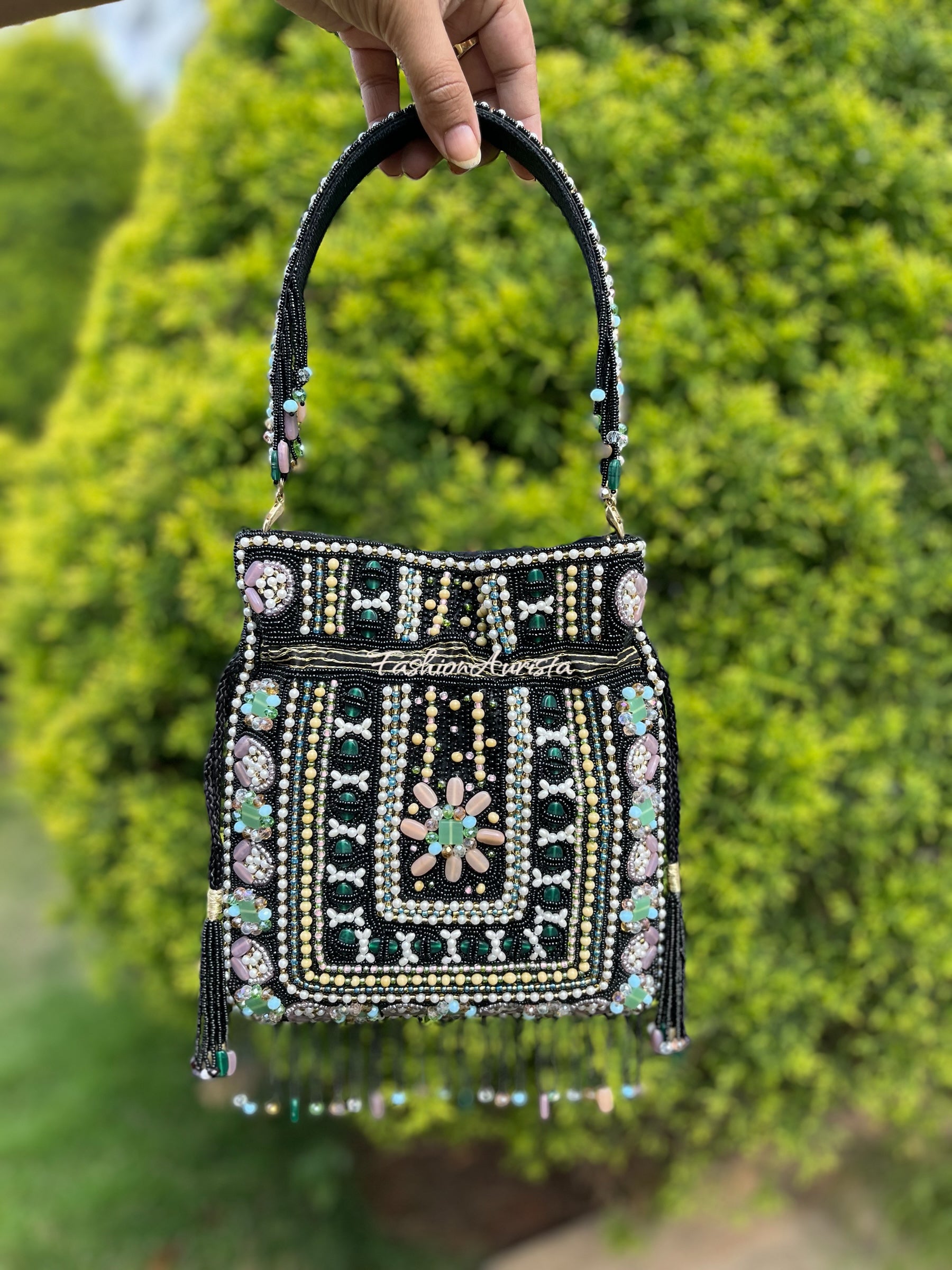 EMERALD STUDDED POTLI