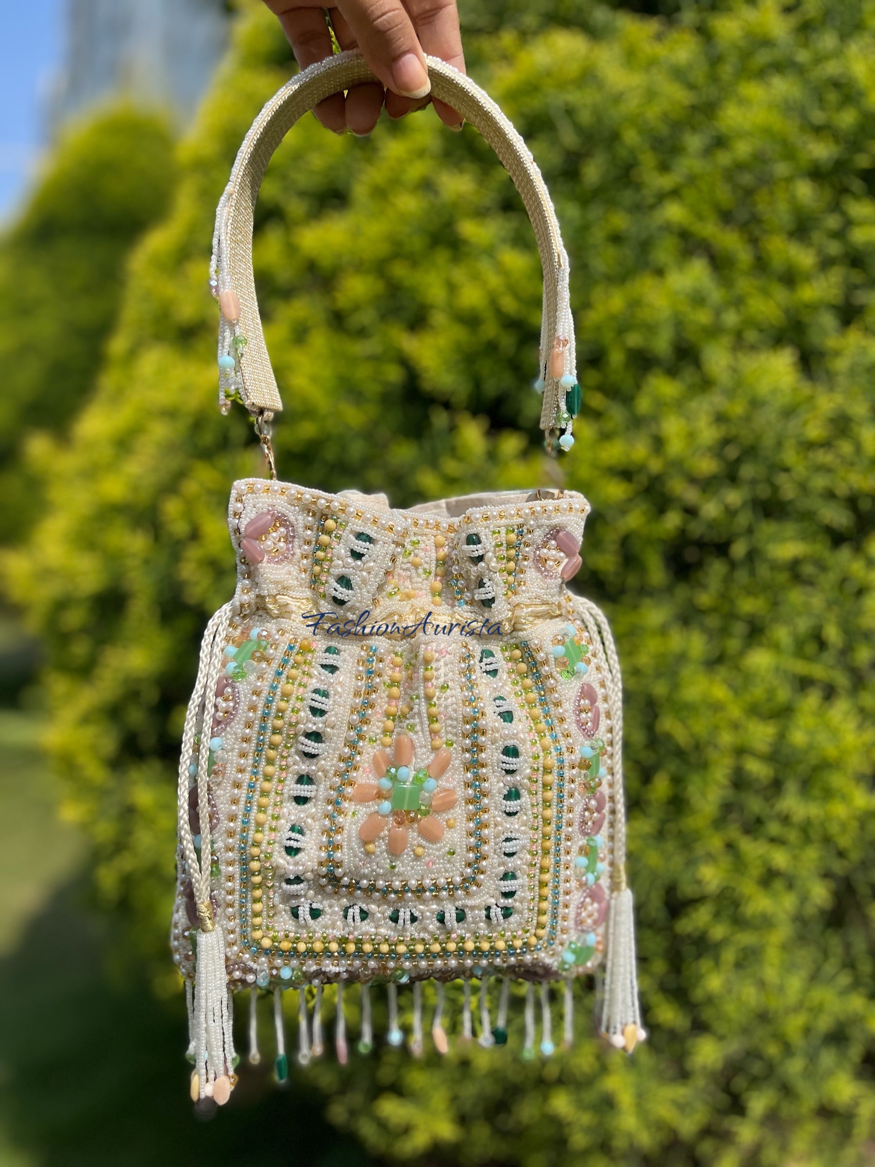 EMERALD STUDDED POTLI