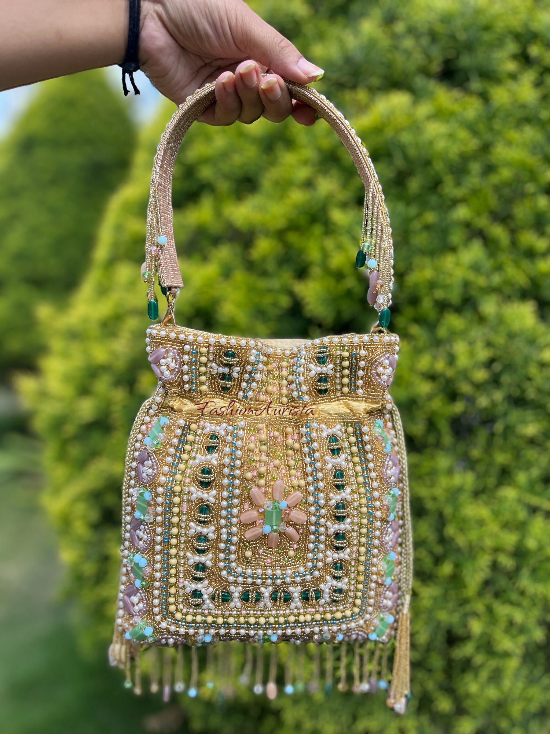 EMERALD STUDDED POTLI