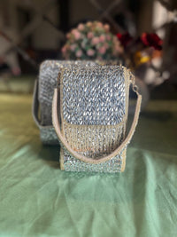 MISHKA SHIMMER MOBILE SLING