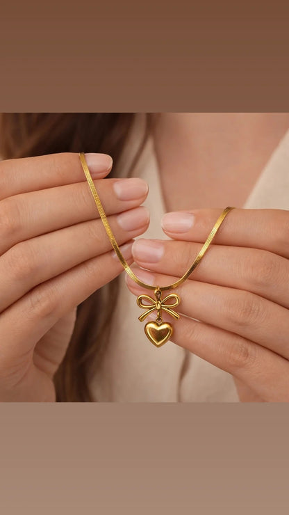 BOW HEART NECKLACE