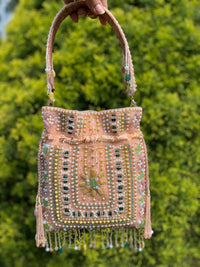 EMERALD STUDDED POTLI