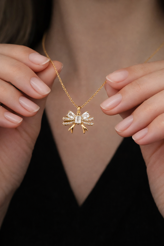 CRYSTAL BOW NECKLACE